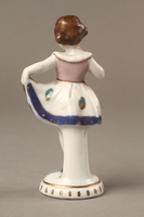 2017.358.2 back
Porcelain figurine of a young girl in a white dress given to a Ukrainian Jewish family

Click to enlarge