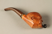 2017.541.8 right
Tobacco pipe with a bowl carved into the shape of Churchill’s head

Click to enlarge