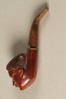 2017.541.7 bottom
Tobacco pipe with a bowl carved into the shape of Hitler’s head

Click to enlarge