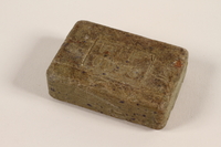 1992.122.2 front
Soap found in a liberated concentration camp by a US soldier

Click to enlarge
