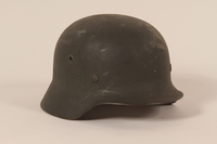 1992.127.1 right side
Wehrmacht helmet found by a US soldier in Aachen

Click to enlarge