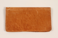 2012.358.2 closed
Light brown leather billfold used by a Polish Jewish refugee

Click to enlarge