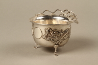 2017.513.6 3/4 view handle down
Silver bowl with a dragon owned by a Lithuanian Jewish refugee in the Shanghai Ghetto

Click to enlarge