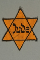 2018.70.4 front
Star of David patch printed with Jude worn by a German Jewish woman

Click to enlarge