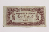 2012.409.11 front
Hungarian 5 pengo paper note issued by the Soviet Army owned by a Hungarian Jewish youth and former concentration camp inmate

Click to enlarge