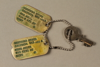2018.204.2 front
Set of US Army issue dog tags and a key on a chain belonging to a German Jewish refugee and soldier

Click to enlarge