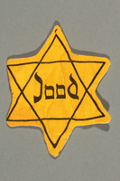 2018.229.2 front
Factory-printed Star of David badge worn by a Jewish person in the Netherlands

Click to enlarge