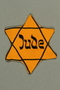 Factory-printed Star of David badge printed with Jude, belonging to a German Jewish woman