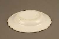 2018.369.5 bottom
Enameled metal soup plate used by a Jewish Polish man in a displaced persons camp

Click to enlarge