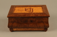 2019.180.2 a-b back
Jewelry box with a secret compartment used to hide documents belonging to German Jewish prisoners

Click to enlarge