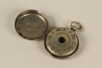 1992.8.2_a-b open
Circular silver 12 tone pocket watch style pitch pipe and case used by a cantor

Click to enlarge