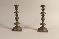 1992.8.28 a-d front
Pair of Sabbath candlesticks with wax reservoirs owned by a Jewish refugee

Click to enlarge