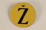 Yellow metal badge with a brown Croatian letter Z to identify a Jew