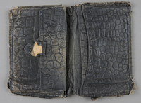 2013.178.5 open
Patterned black leather wallet used by a Polish Jewish refugee

Click to enlarge