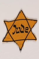 1993.153.2 front
Star of David badge printed Jude worn by a Jewish doctor

Click to enlarge