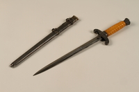 1989.10.2 open
Yellow handled dagger with an engraved Reichsadler with sheath acquired by a US soldier

Click to enlarge