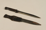 Dagger with grooved handle and sheath acquired by a US soldier from German troops