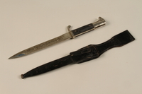 1989.10.6 open
Dagger embossed with a motto and Reichsadler with sheath acquired by a US soldier from German troops

Click to enlarge