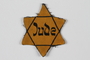 Star of David badge with Jude printed in the center