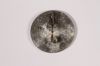 2014.480.50 back
1938 May Day pin acquired by a US soldier

Click to enlarge