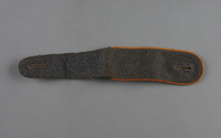 2013.453.8 front
Wehrmacht shoulder board in gray with gold trim acquired by a US soldier

Click to enlarge