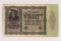 2013.455.5 front
Weimar Germany, 50000 mark note, from the album of a Waffen-SS officer acquired by an American soldier

Click to enlarge