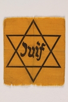 1994.31.1 front
Star of David badge with Juif printed in the center

Click to enlarge
