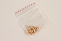 1994.4.1 front
Honey cookie crumbs from a package sent by her parents to a Hungarian Jewish girl

Click to enlarge