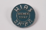 Blue and silver HIAS pin worn by a Jewish Latvian youth postwar