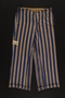 Concentration camp uniform pants with red triangle patch worn by Polish Jewish inmate