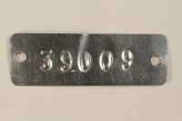 1994.74.1 front
Auschwitz concentration camp metal prisoner identification tag

Click to enlarge