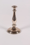 Silver floral embossed candlestick acquired by a former Kindertransport refugee
