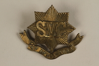 1989.243.272 front
Shanghai Volunteer Corps badge issued to a Jewish refugee in Shanghai

Click to enlarge