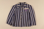 Concentration camp uniform jacket with a purple triangle worn by a Jehovah’s Witness inmate