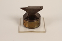 1989.259.1 front
Anvil-shaped paperweight given to a US soldier serving as a displaced persons camp administrator

Click to enlarge