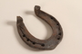 Horseshoe with nails used by a Romani